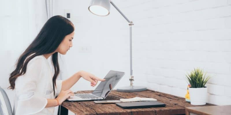 woman at desk on laptop