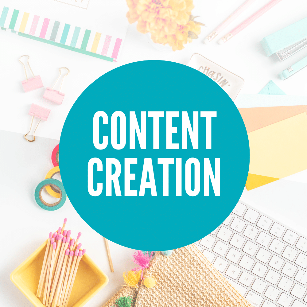 A vibrant and neatly arranged desktop with various office supplies, featuring a central teal circle with the words "content creation for freelancing" inscribed in white font.