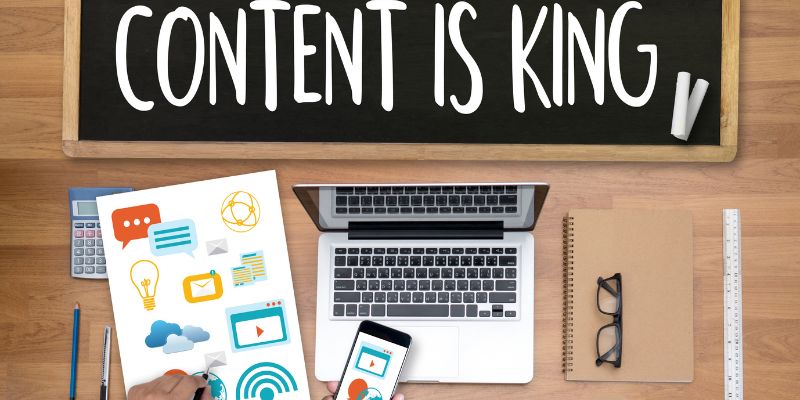 content is king sign with a laptop for deciding on content formats