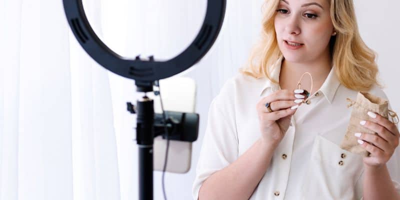 fashion blogger filming jewelry for Christmas blog post idea