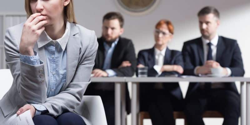 woman waiting on decision by interview panel