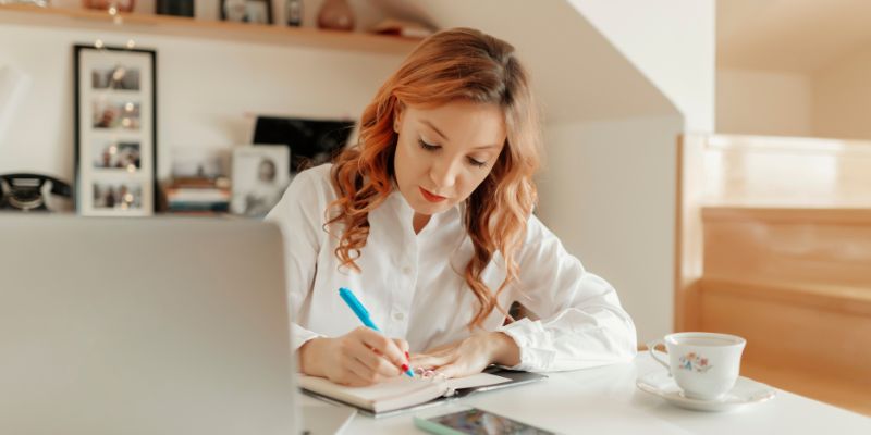 woman at her desk working on character viewpoints